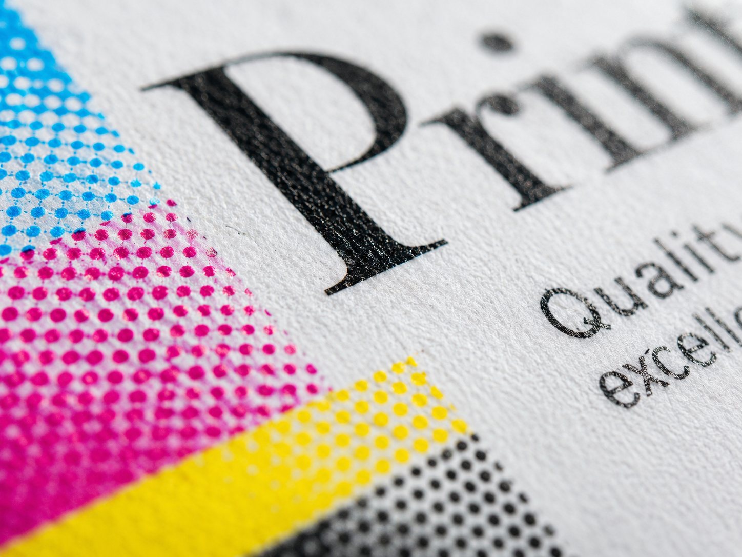 Macro shot of printed paper showing crisp halftone detail